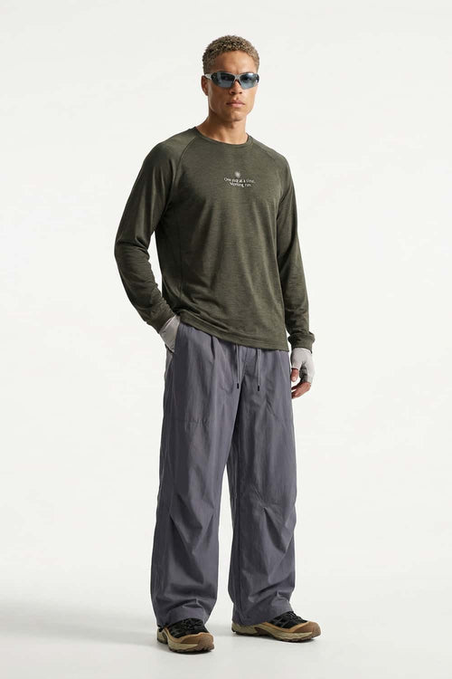 Waterproof Wide-Leg Drawcord Trousers in Dark Gray - full-length front modeled view