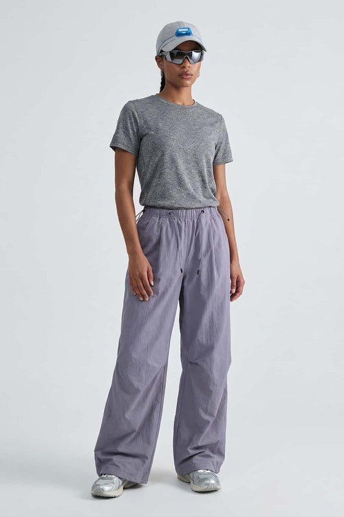 Waterproof Wide-Leg Drawcord Trousers in Light Purple - full-length front modeled view