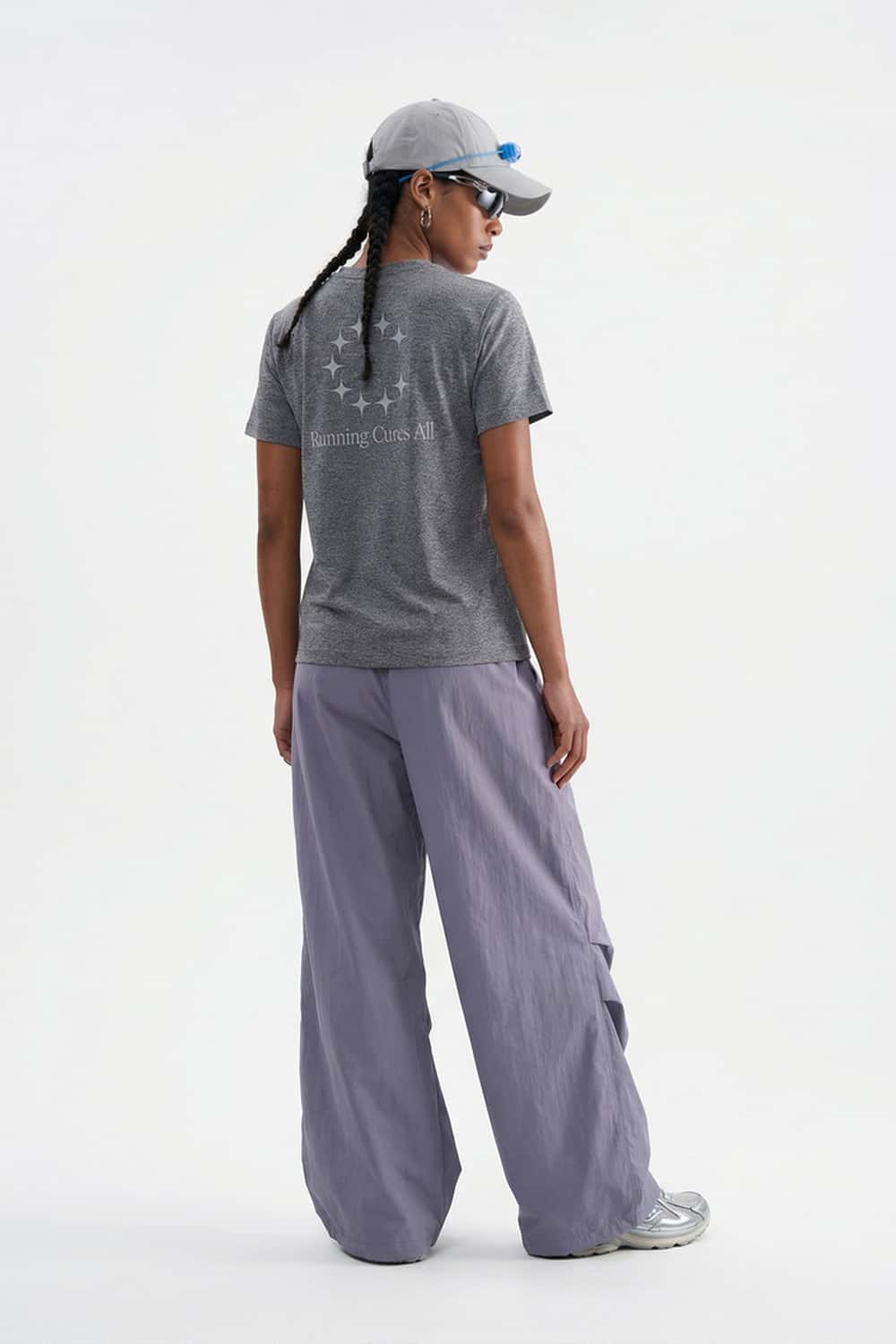 Waterproof Wide-Leg Drawcord Trousers in Light Purple - full-length back modeled view
