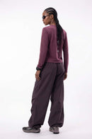 Waterproof Wide-Leg Drawcord Trousers in Reddish Brown - full-length back modeled view