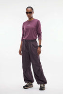 Waterproof Wide-Leg Drawcord Trousers in Reddish Brown - full-length front modeled view