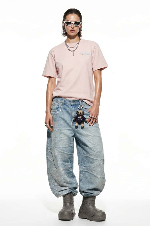 Tennis Club Graphic Cotton-Blend T-Shirt in Pale Pink - full-length front modeled view