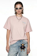 Tennis Club Graphic Cotton-Blend T-Shirt in Pale Pink - front modeled view