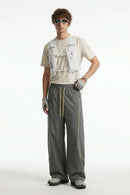 Curved-Trim Wide-Leg Drawcord Pants in Dark Gray - full-length front modeled view