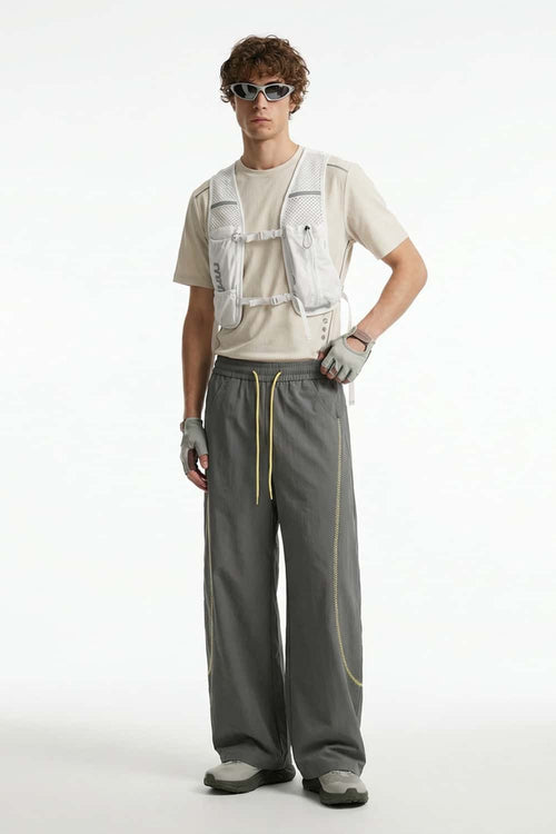 Curved-Trim Wide-Leg Drawcord Pants in Dark Gray - full-length front modeled view