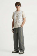 Curved-Trim Wide-Leg Drawcord Pants in Dark Gray - full-length front modeled view