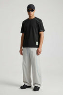 Curved-Trim Wide-Leg Drawcord Pants in Gray - full-length front modeled view