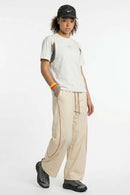 Curved-Trim Wide-Leg Drawcord Pants in Khaki - full-length front modeled view