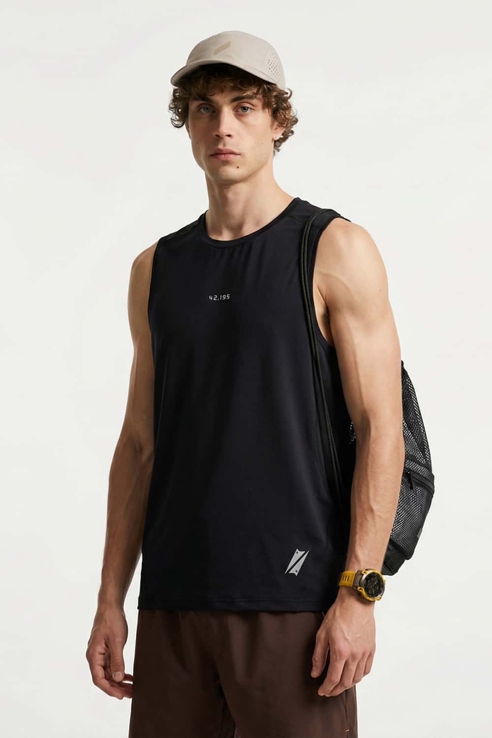 High-Stretch Panelled Training Tank in Black - three-quarter front modeled view