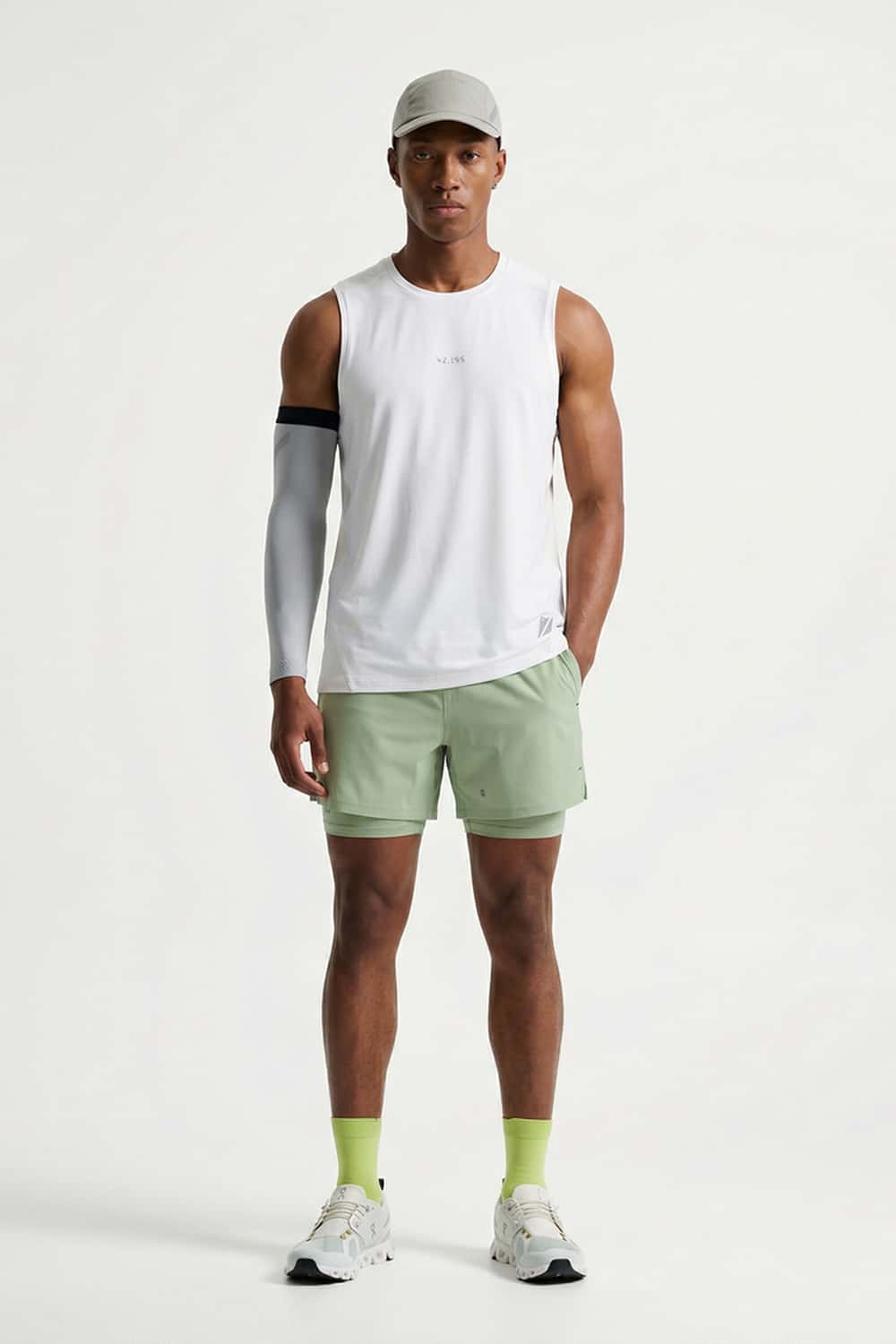 High-Stretch Panelled Training Tank in White - full-length front modeled view