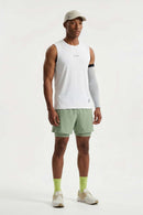 High-Stretch Panelled Training Tank in White - full-length front modeled view