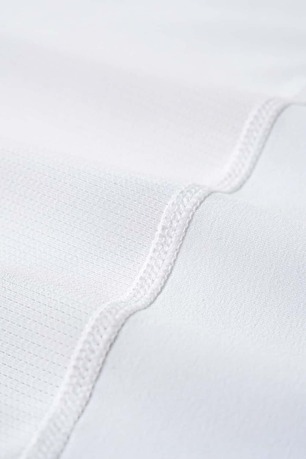 High-Stretch Panelled Training Tank in White - seam and stitching detail
