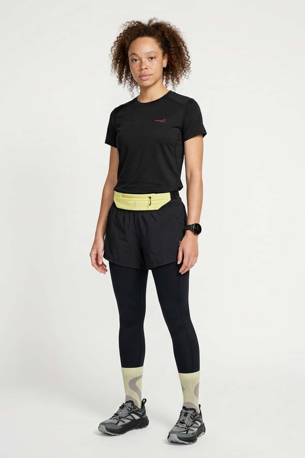 Women's Quick-Drying Panelled Training T-Shirt in Black - full-length front modeled view