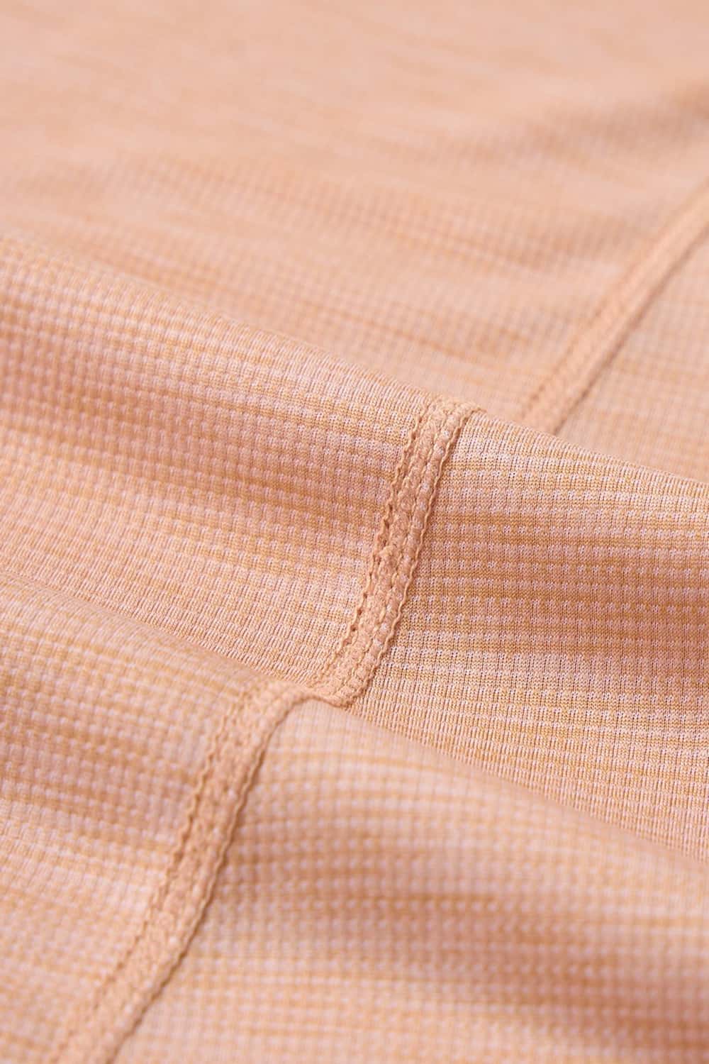 Women's Quick-Drying Panelled Training T-Shirt in Pink - fabric texture close-up