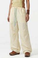 Waterproof Wide-Leg Utility Pants in Khaki - front modeled close-up
