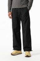 Waterproof Drawcord Cargo Pants in Black - front modeled view