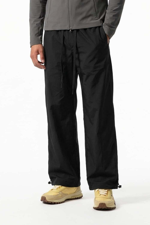 Waterproof Drawcord Cargo Pants in Black - front modeled view