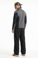 Waterproof Drawcord Cargo Pants in Black - full-length back modeled view