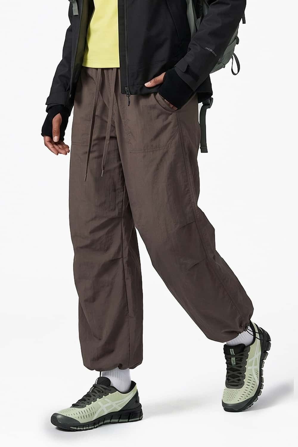 Waterproof Drawcord Cargo Pants in Brown - three-quarter front modeled view