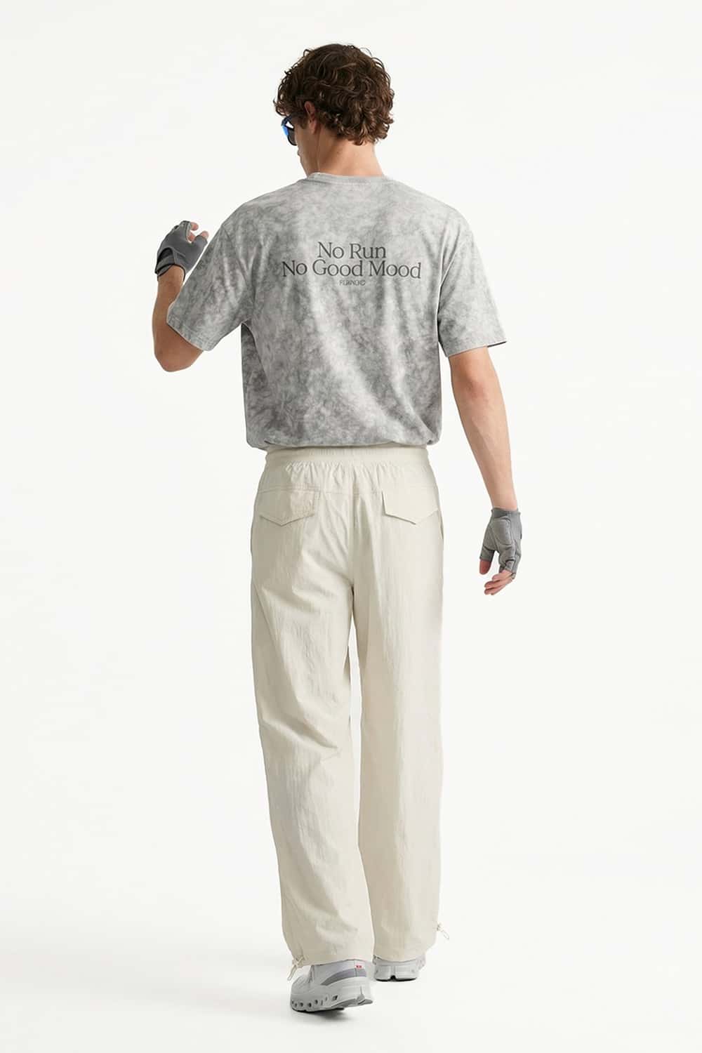 Waterproof Drawcord Cargo Pants in Khaki - full-length back modeled view