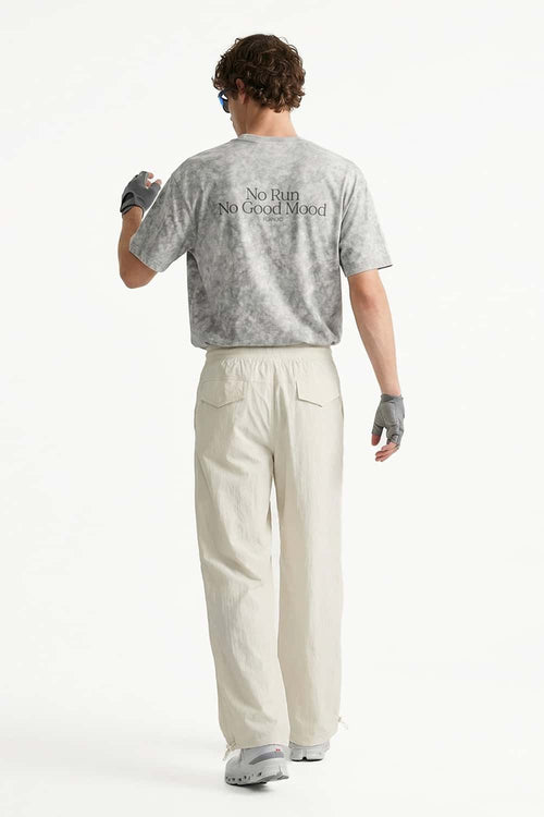 Waterproof Drawcord Cargo Pants in Khaki - full-length back modeled view