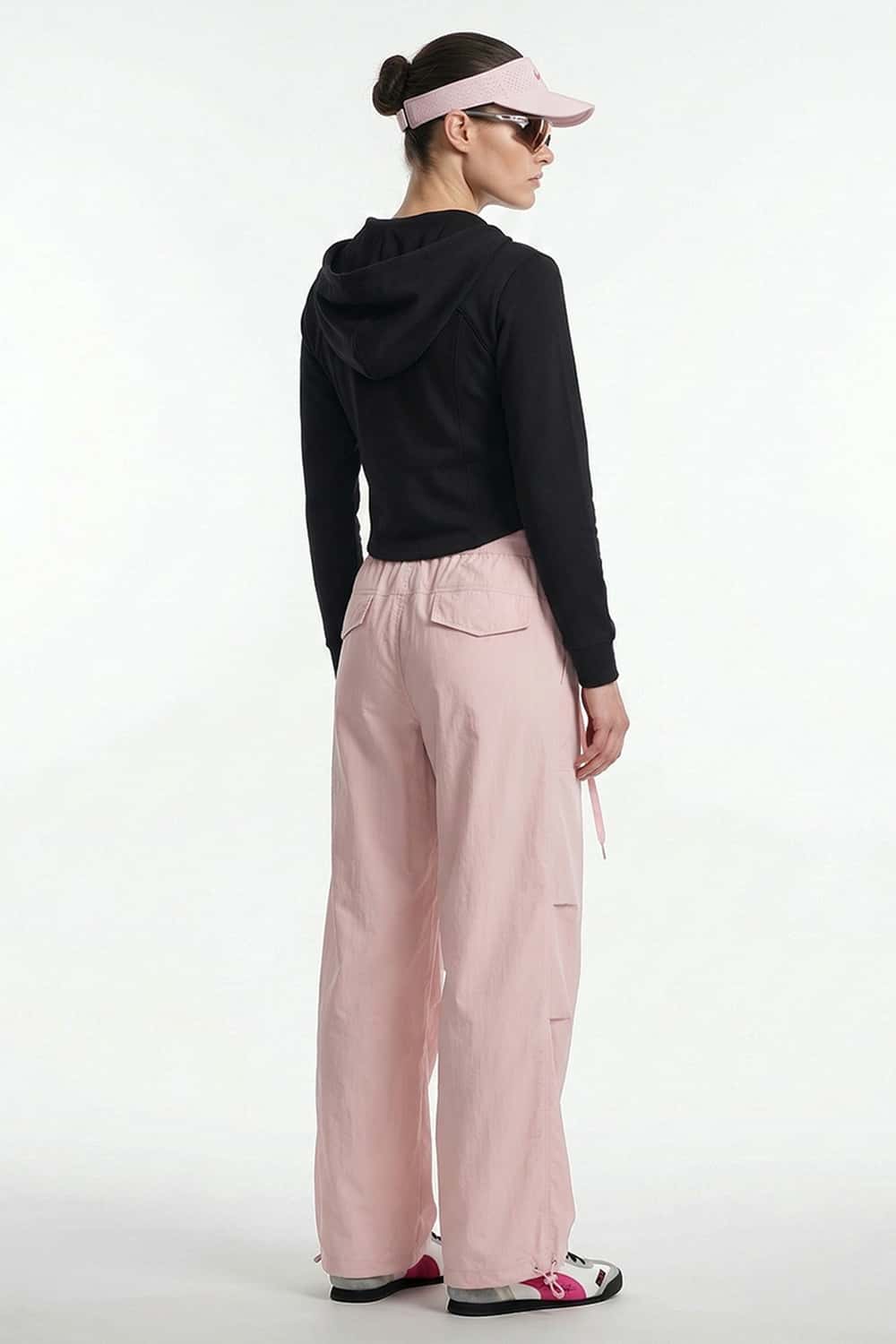 Waterproof Drawcord Cargo Pants in Pink - full-length back modeled view
