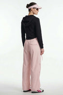 Waterproof Drawcord Cargo Pants in Pink - full-length back modeled view