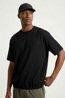 Adjustable-Hem Quick-Drying T-Shirt in Black - three-quarter front modeled view