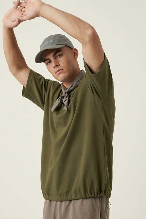 Adjustable-Hem Quick-Drying T-Shirt in Military Green - three-quarter front modeled view