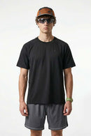 Quick-Drying Curved-Seam Sports T-Shirt in Black - front modeled view