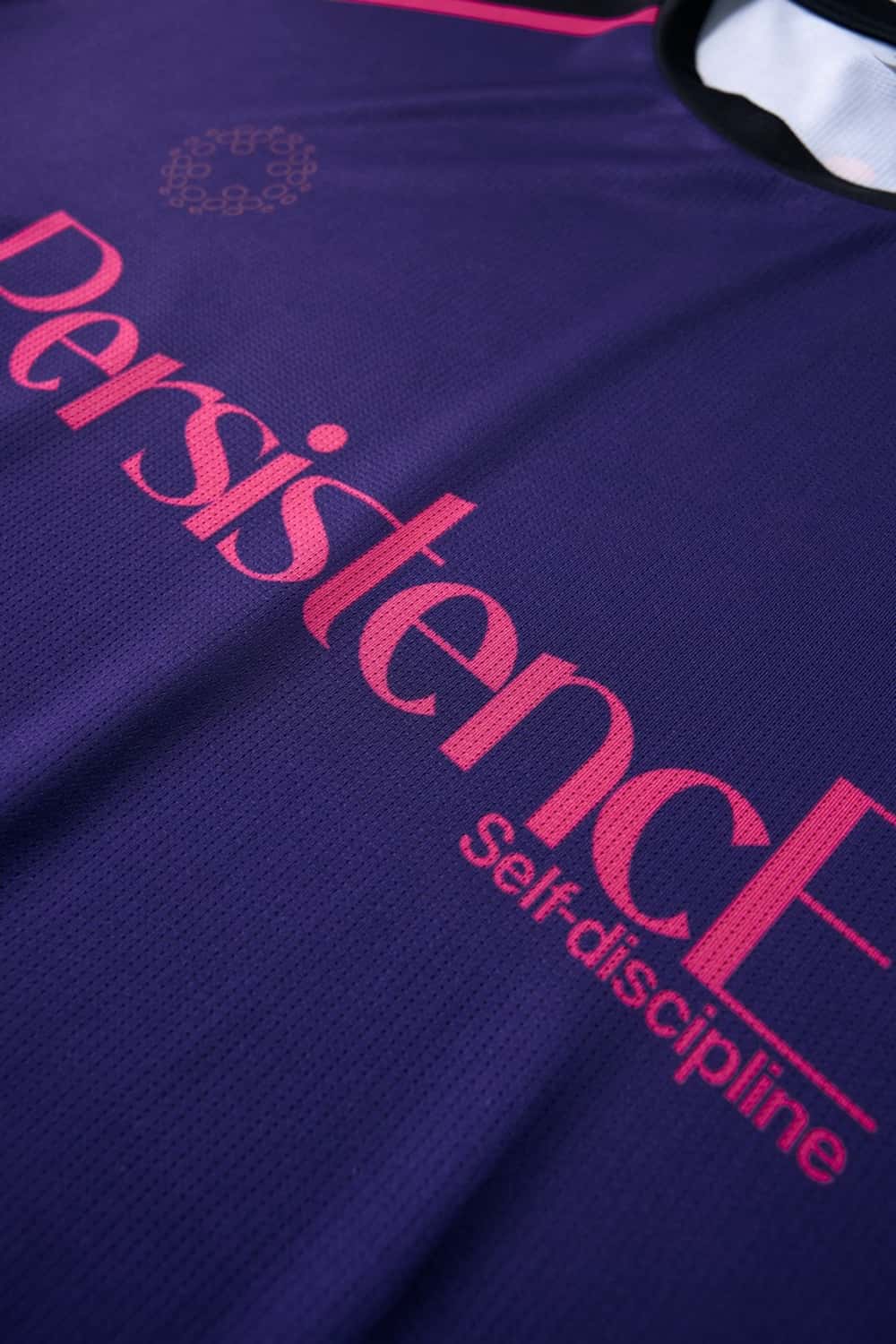 Breathable Panelled Graphic Sports T-Shirt in Black - fabric texture close-up