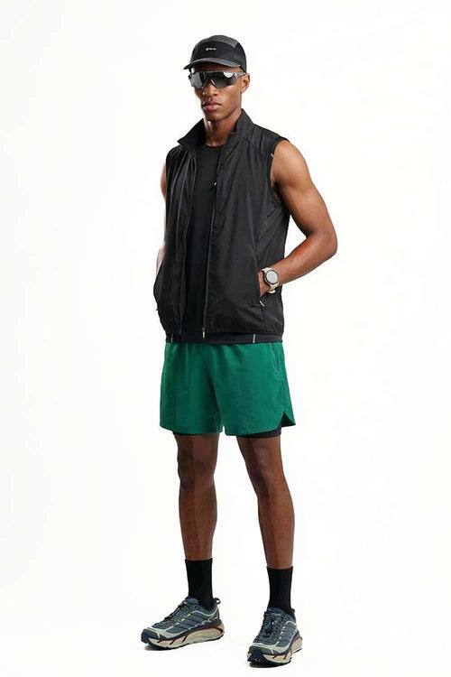 Breathable Four-Pocket Zip Vest in Black - full-length front modeled view