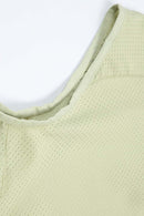 Breathable Four-Pocket Zip Vest in Green - fabric texture close-up