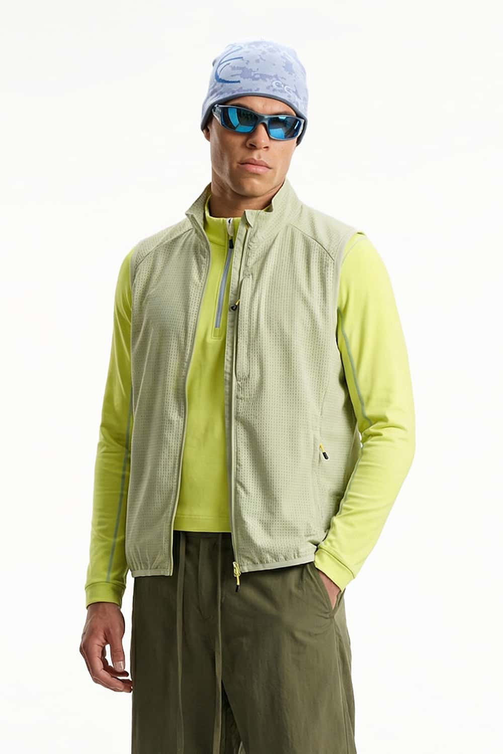 Breathable Four-Pocket Zip Vest in Green - three-quarter front modeled view