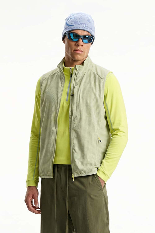 Breathable Four-Pocket Zip Vest in Green - three-quarter front modeled view