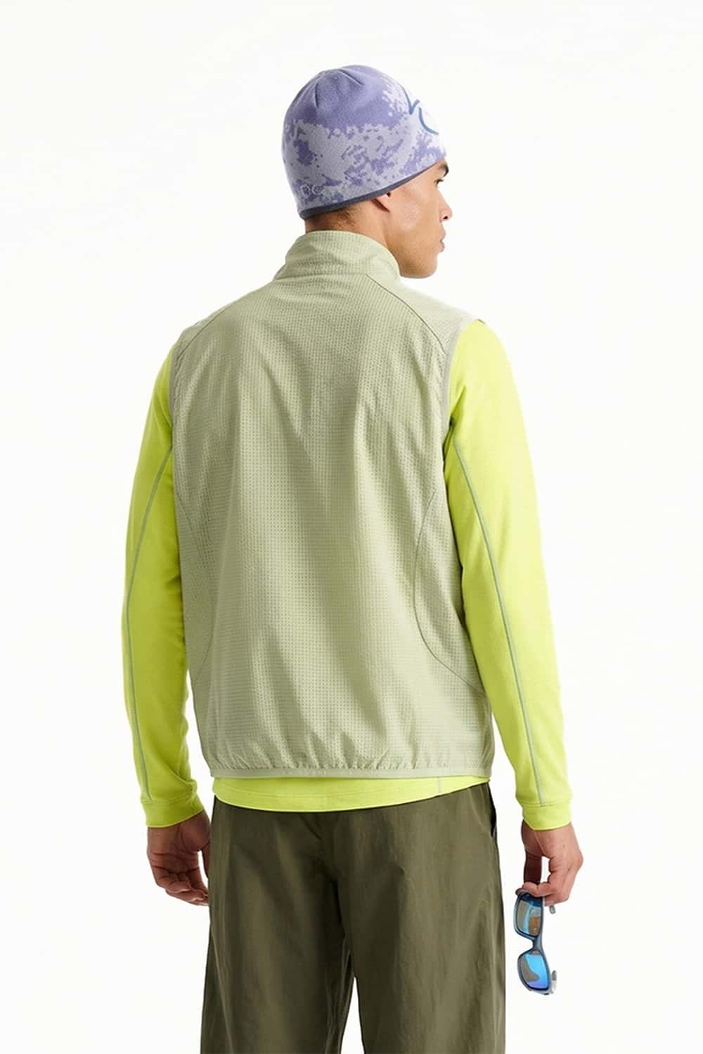 Breathable Four-Pocket Zip Vest in Green - rear three-quarter modeled view