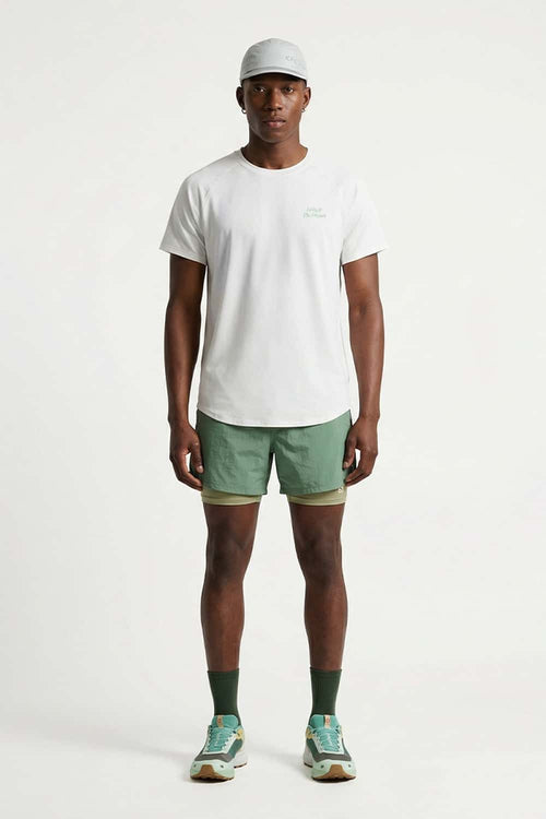 Skin-Friendly Curved-Hem Graphic T-Shirt in White - full-length front modeled view