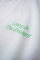 Skin-Friendly Curved-Hem Graphic T-Shirt in White - graphic detail