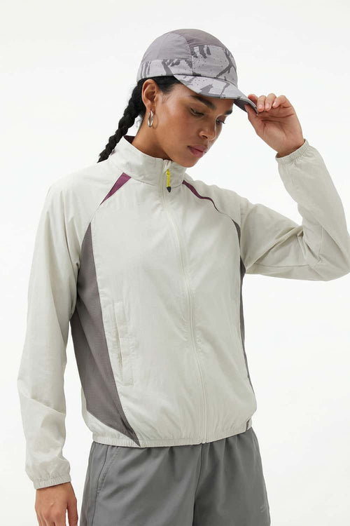 Sun-Protective Panelled Zip Jacket in Beige - front modeled close-up