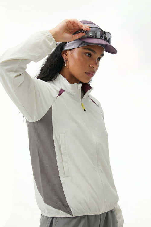Sun-Protective Panelled Zip Jacket in Beige - three-quarter front modeled view