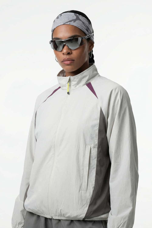 Sun-Protective Panelled Zip Jacket in Beige - front modeled close-up
