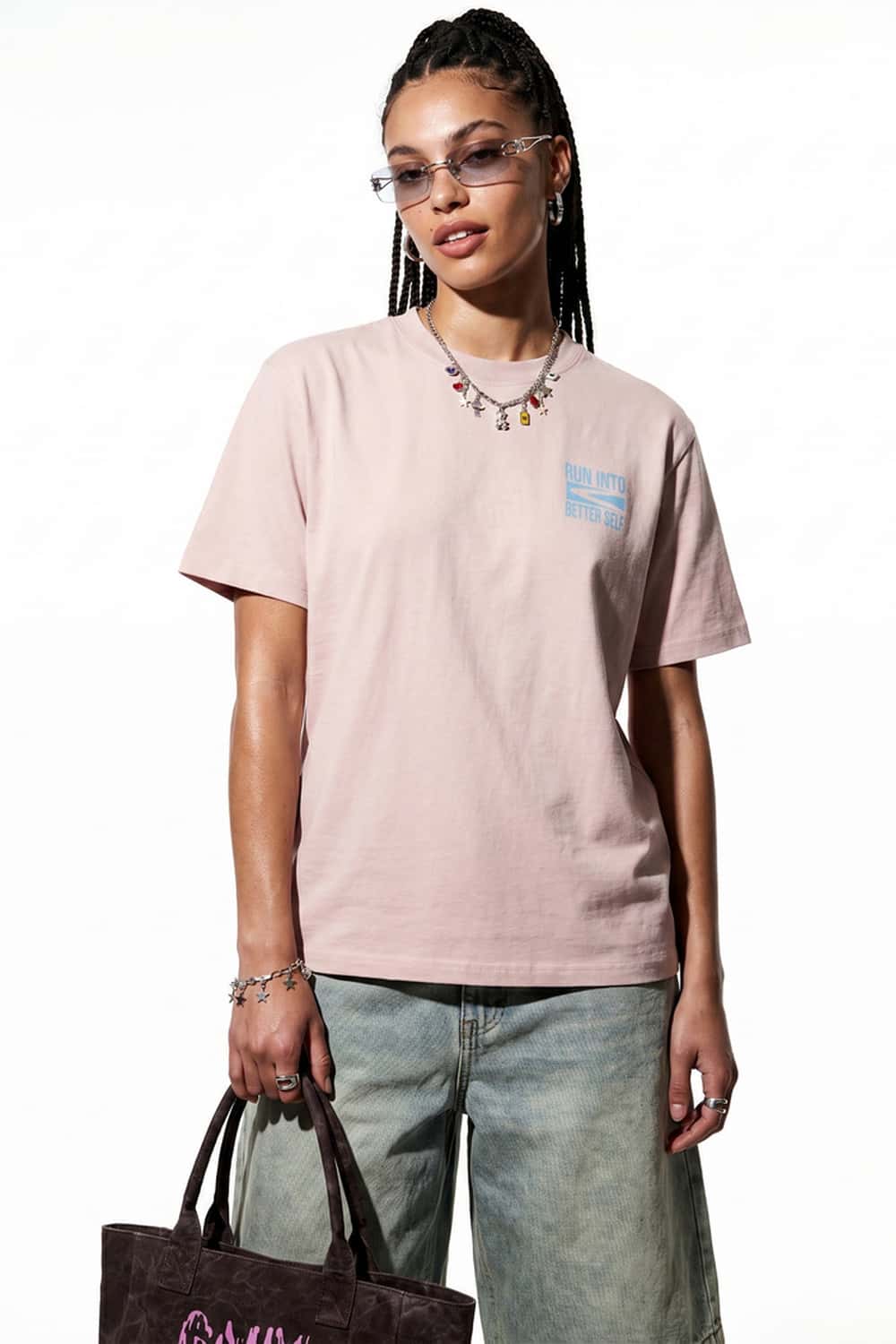 Relaxed Runner Graphic T-Shirt in Pale Pink - front modeled close-up