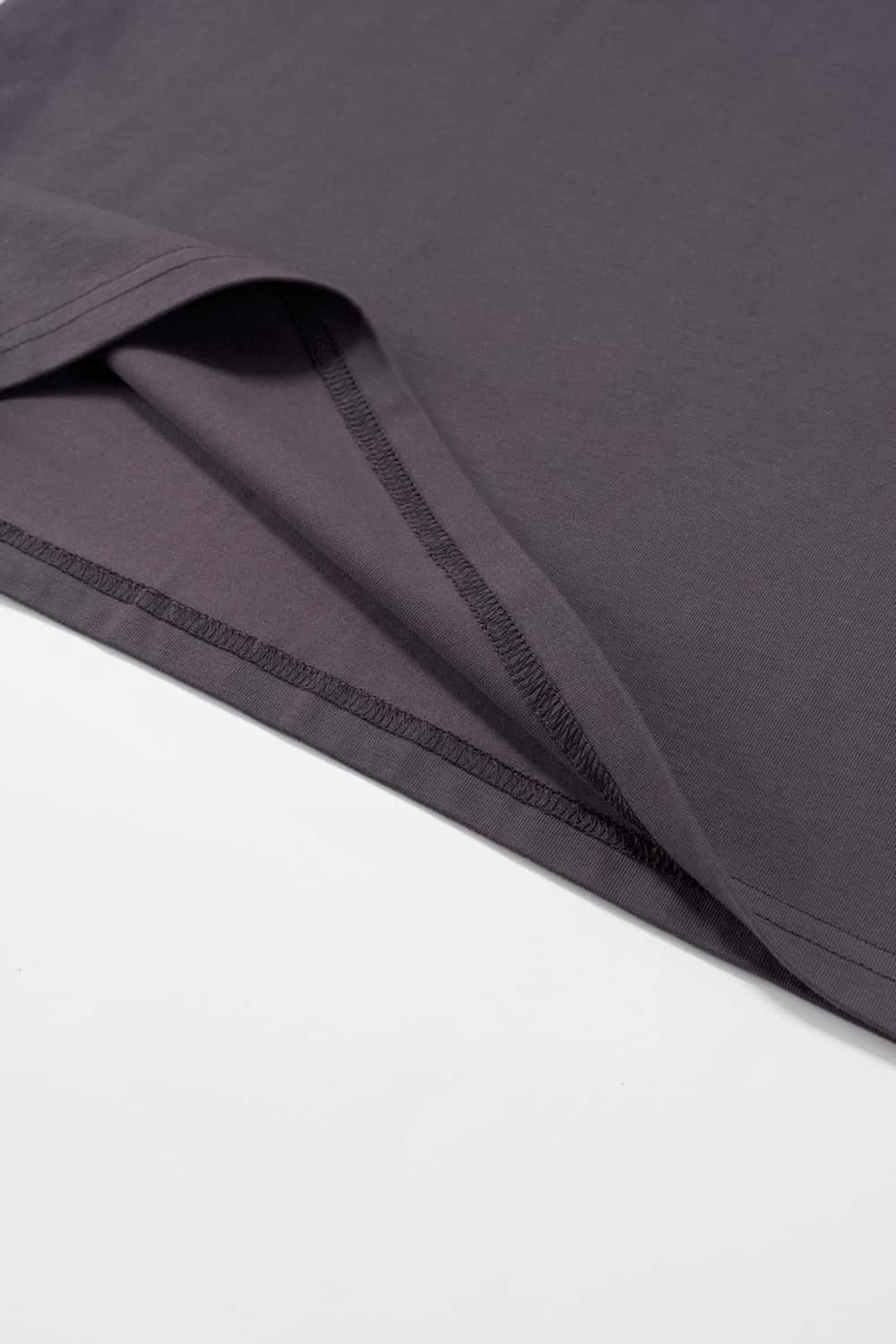 Relaxed Runner Graphic T-Shirt in Plum Purple - hem detail