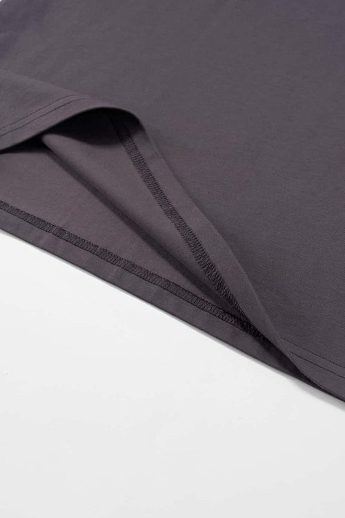 Relaxed Runner Graphic T-Shirt in Plum Purple - hem detail