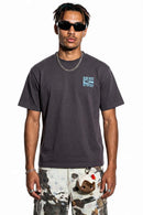 Relaxed Runner Graphic T-Shirt in Plum Purple - front modeled close-up