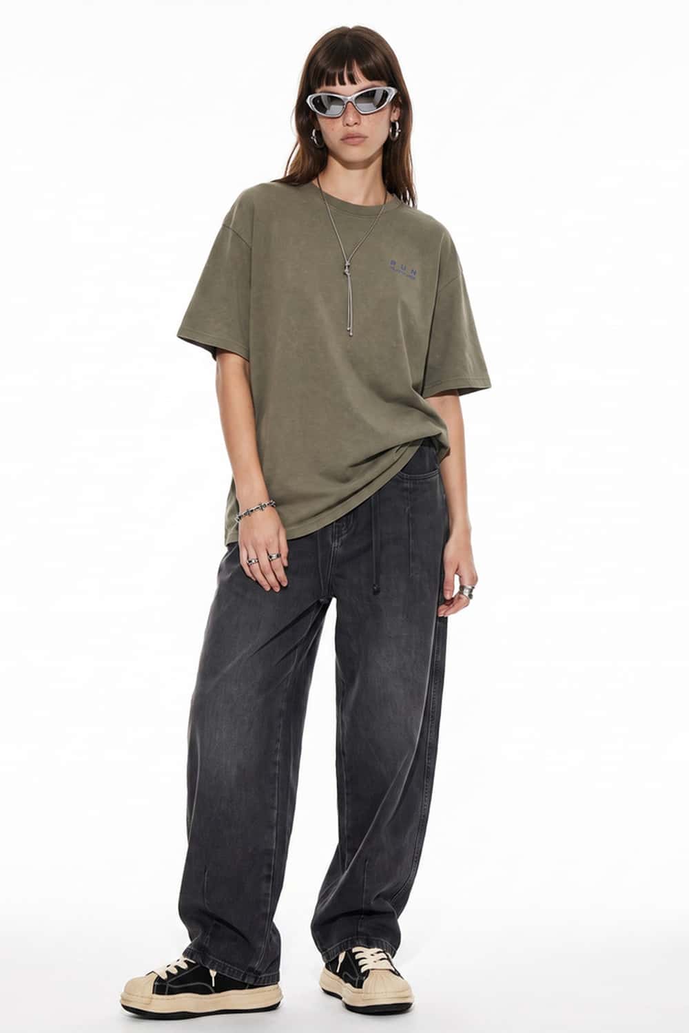 Relaxed Wide-Leg Cotton Trousers in Black - full-length front modeled view