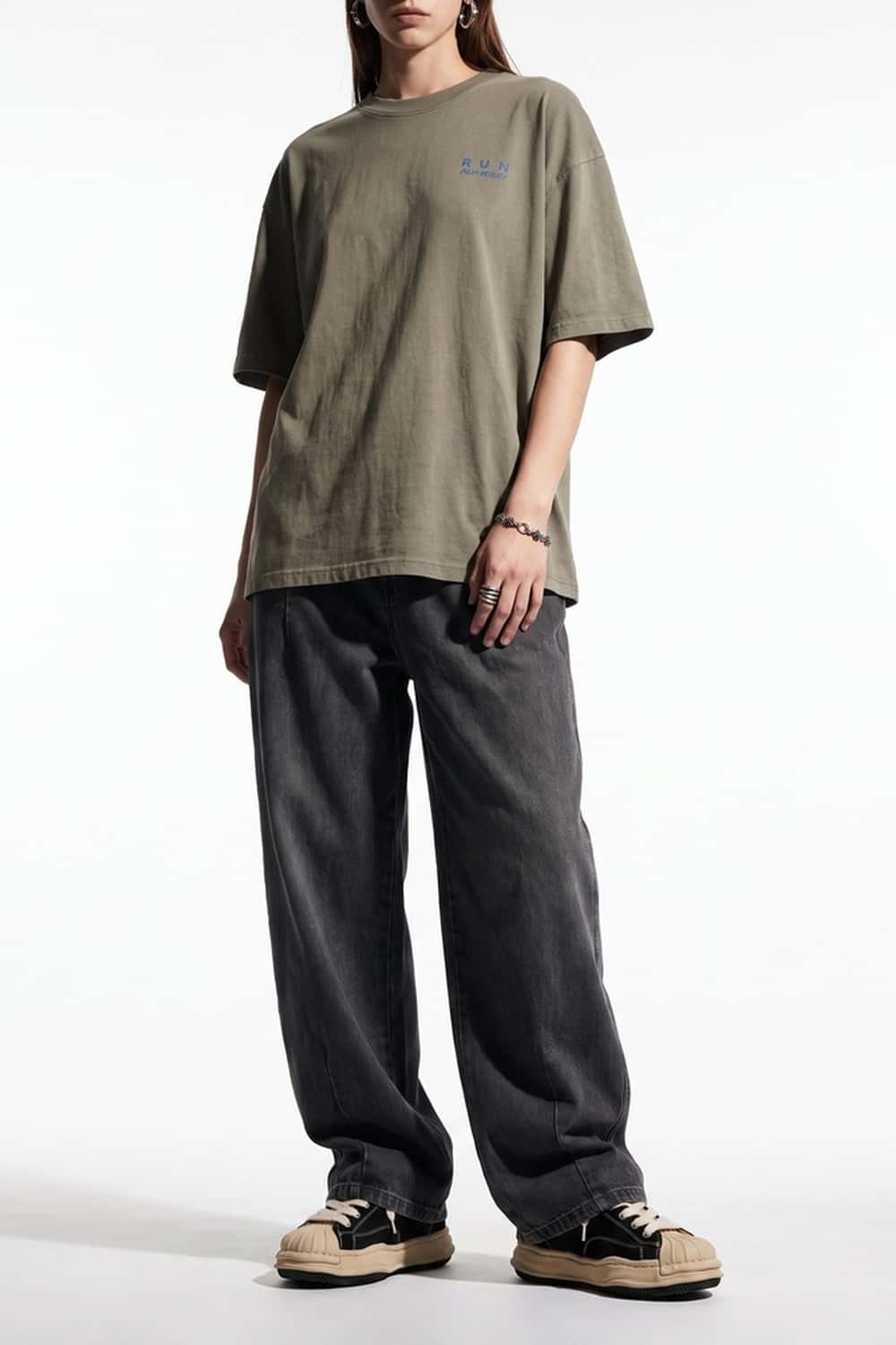 Relaxed Wide-Leg Cotton Trousers in Black - front modeled view