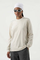 Exposed-Stitch Cotton Long-Sleeve Top in Apricot - front modeled view