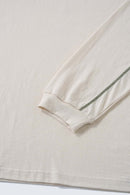 Exposed-Stitch Cotton Long-Sleeve Top in Apricot - cuff detail