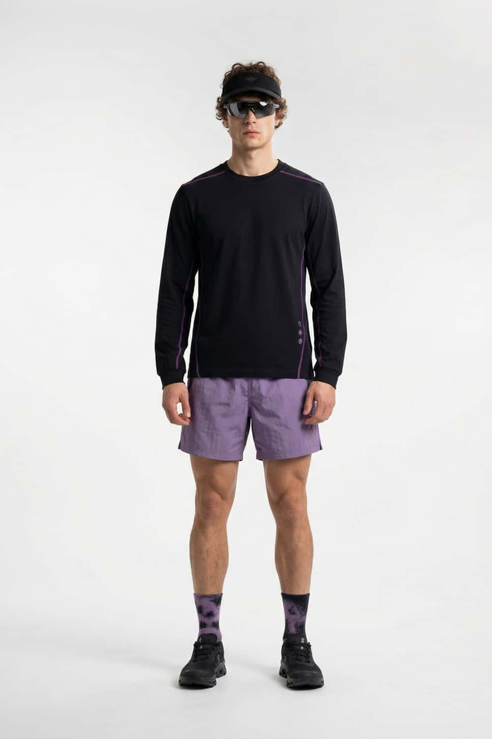 Exposed-Stitch Cotton Long-Sleeve Top in Black - full-length front modeled view